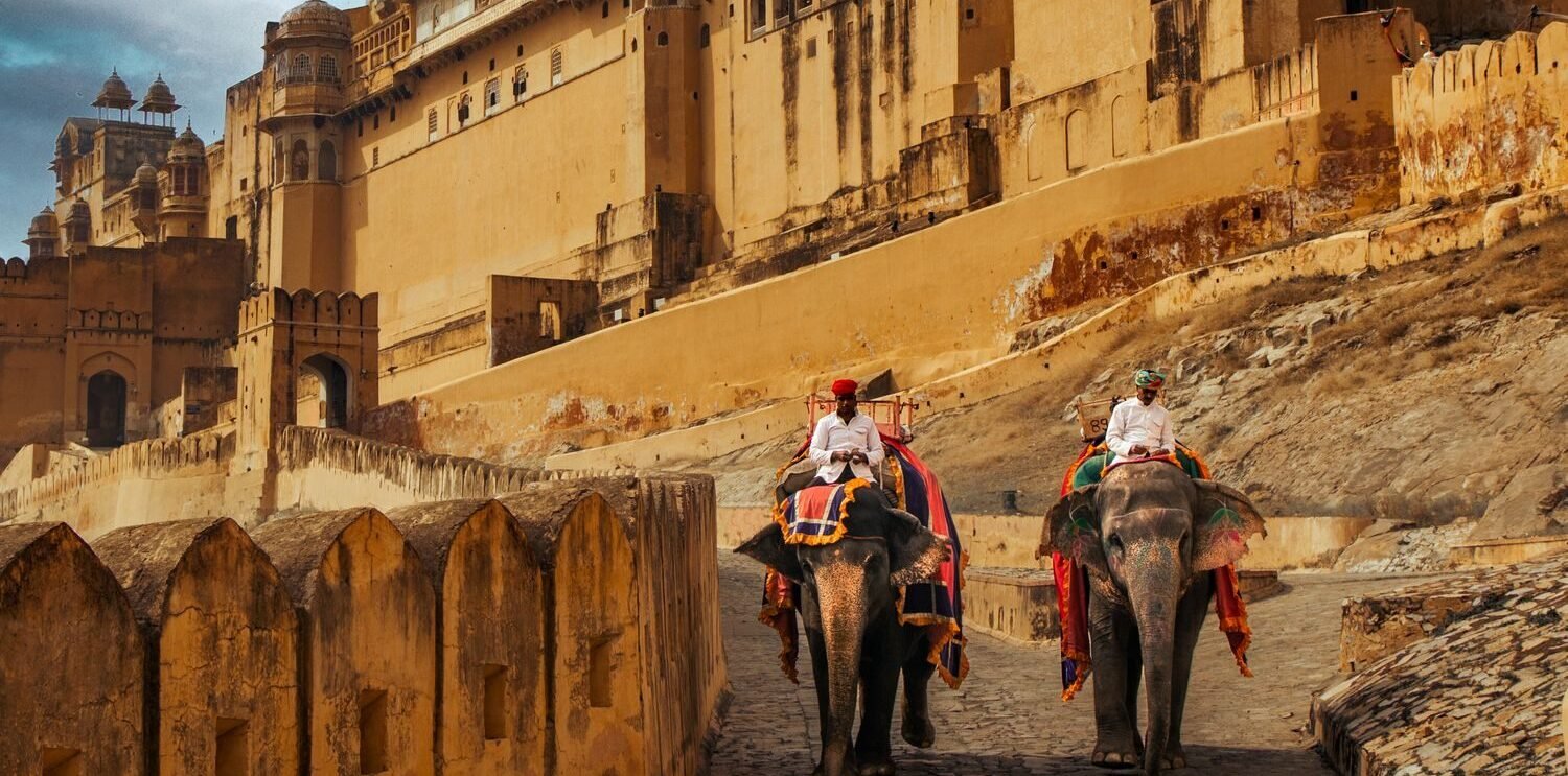 Explore the grandeur of Amber Fort in Jaipur with traditional elephant rides beneath its ancient walls.